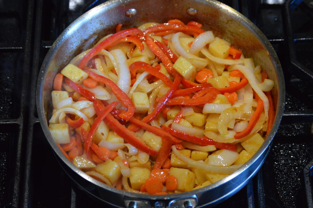 the onion and bell peppers are cooked as weel