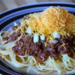 a plate of the finished Cincinnati chili 4 way