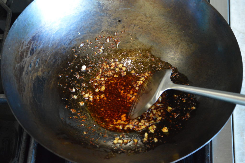 sautéing the chili and garlic