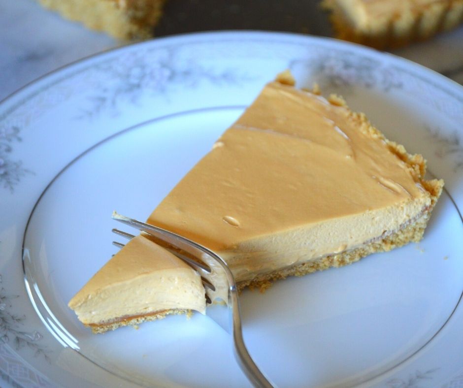 a fork cutting into the dessert