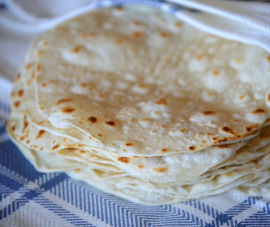 a stack of the finished flour tortillas
