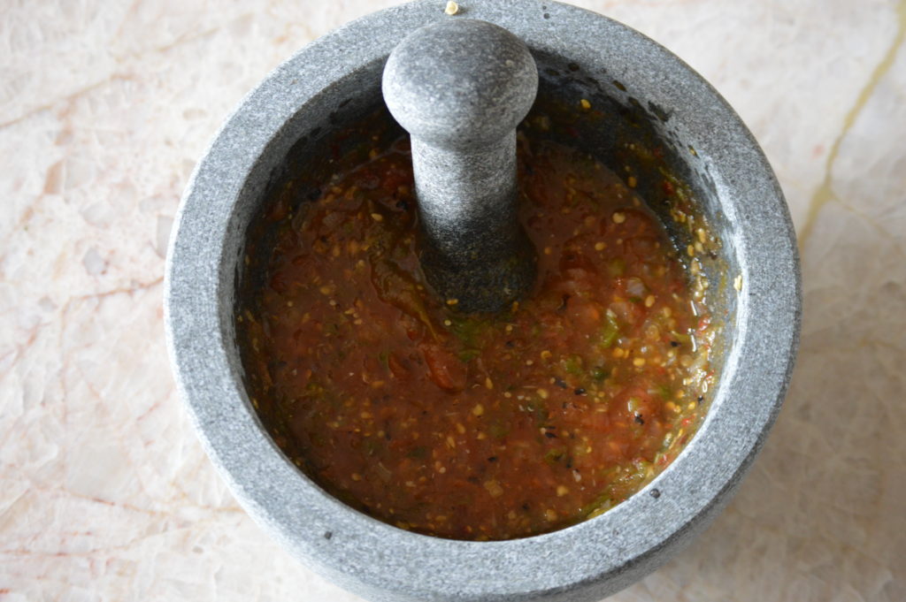 finishing our salsa molcajete