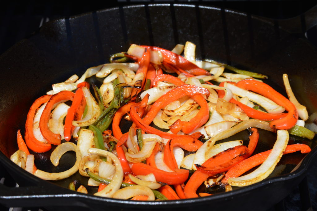 cooking the onion and bell peppers