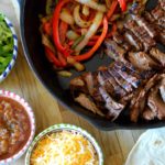 the finished steak fajitas ready to be assembled