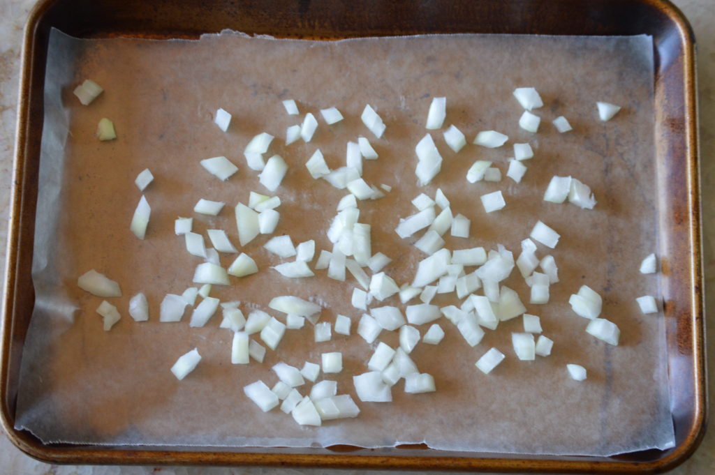 laying our diced onion out on a baking sheet