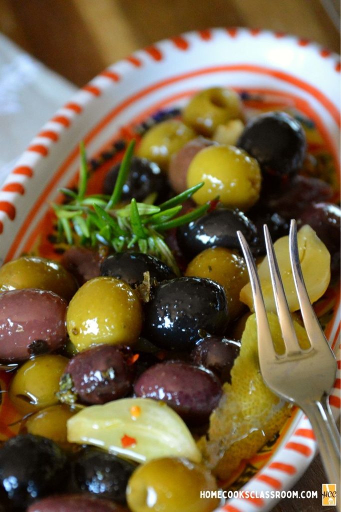 some of the marinated olives in a bowl