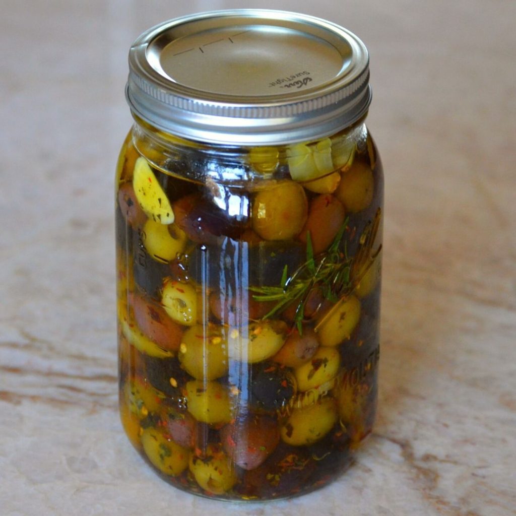 a jar of the marinated oilves