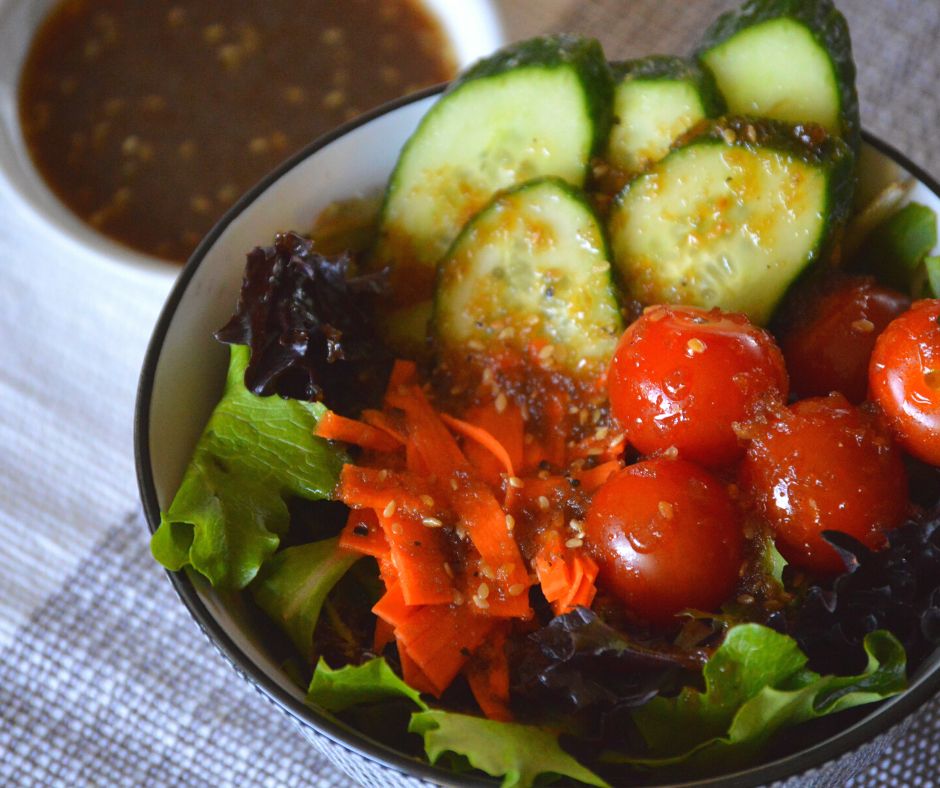 a salad with the finished wafu dressing