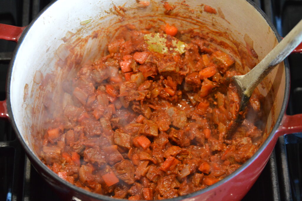 the spices are mixed in for the base of our goulash