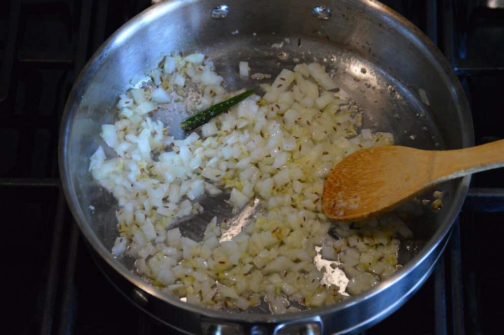 sautéing onion with the aromatic ingredients