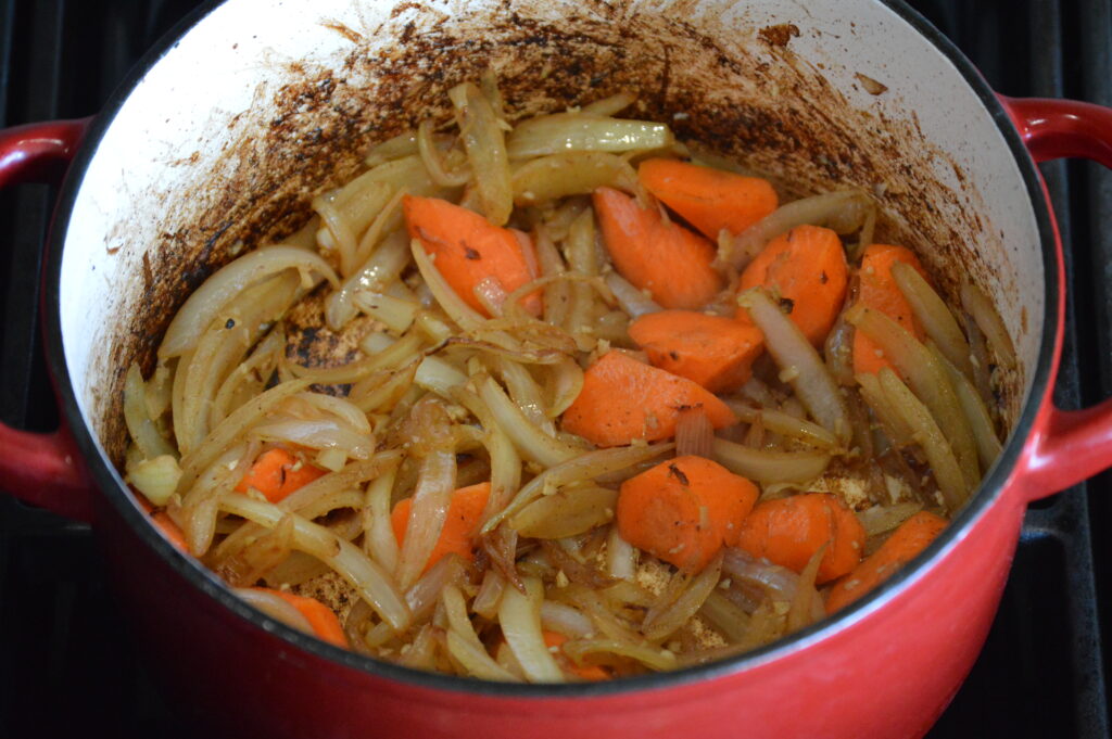 the carrots and aromatics are cooked in the pot as well