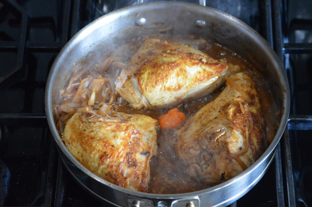 the chicken yassa is cooking