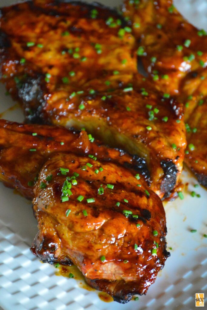 a plate of the finished apricot glazed pork chops