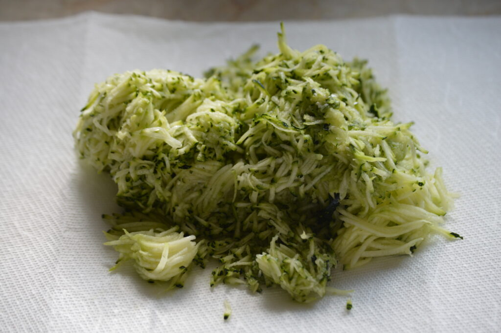 the grated zucchini before the moisture is rung out