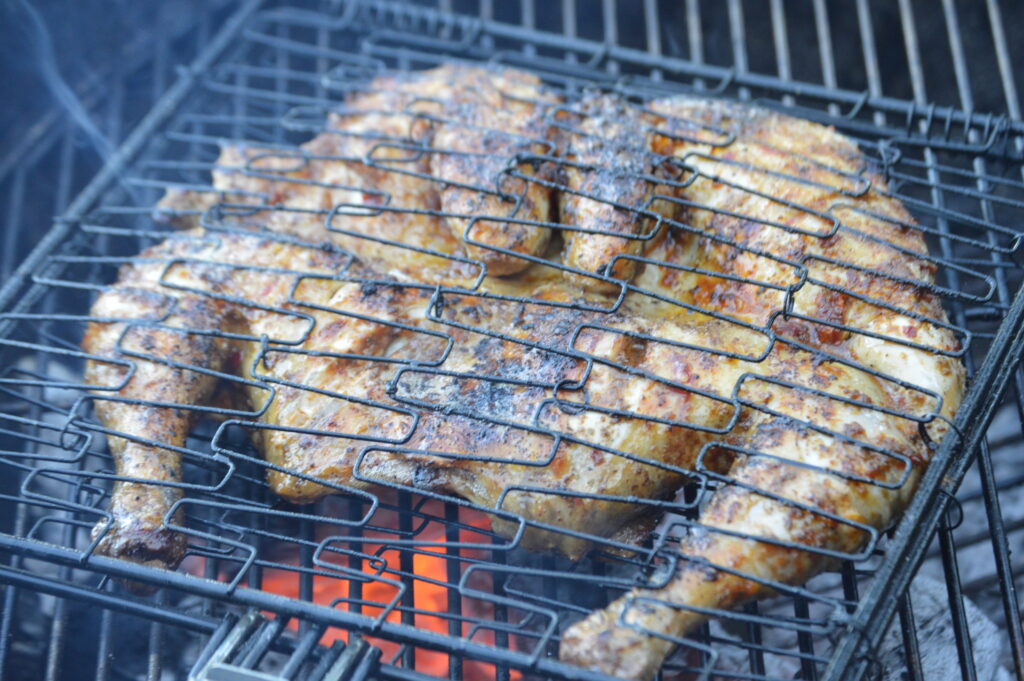 the piri piri chicken is just about done grilling